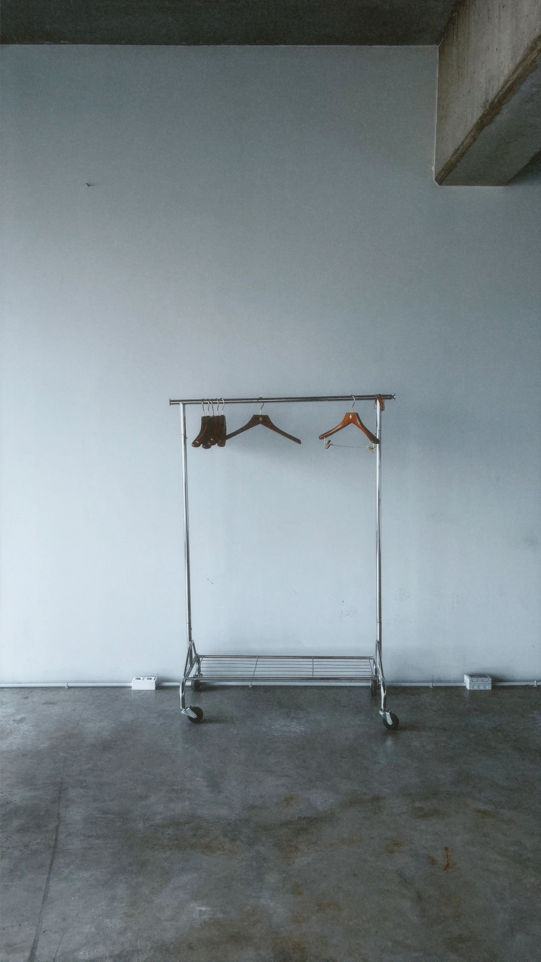Minimal showroom rack in an industrial interior